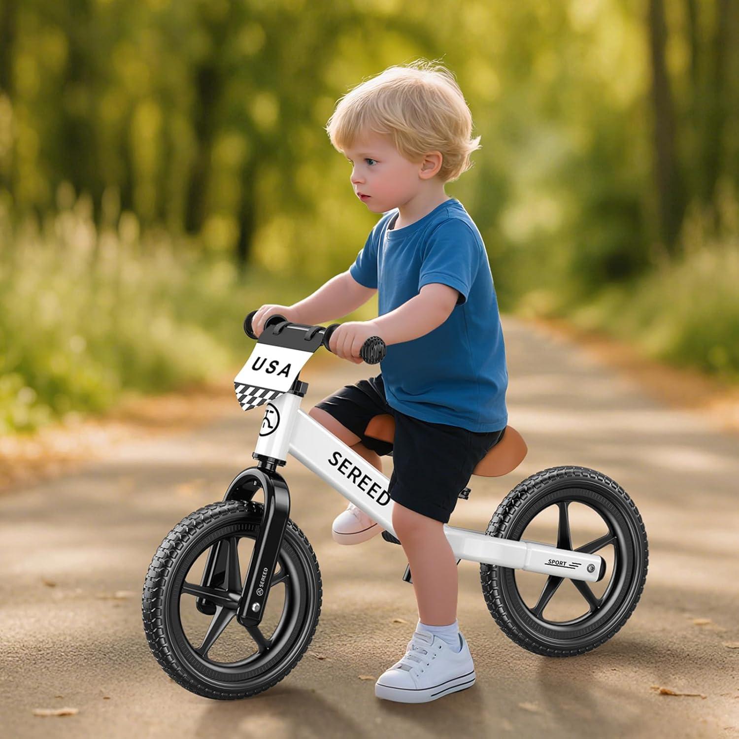 imageSEREED Toddler Balance Bike 2 Year Old No Pedal Kids Toy Bike for 25 Years Old ToolFree Adjustment Gift for 23 Girls Customize Plate with 3pcs Stickers PinkWhite